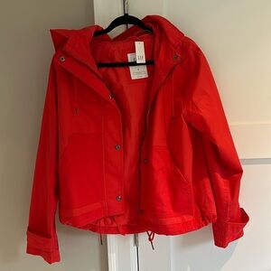 Women’s red raincoat